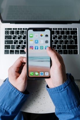 Person holding iPhone