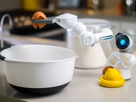 robot cracking an egg