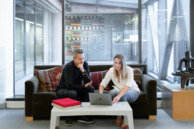 Salesforce is a powerful platform which now works across different business operations. Pictured - sales managers in discussion. Image credit: LinkedIn Sales Solutions via Unsplash, free license
