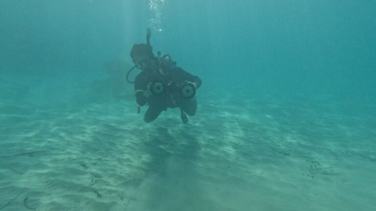 AI in Ocean Depths: Mapping the Invisible - SentiSight.ai Junaed Sattar diving with MeCO during a week-long sea trail in the Caribbean Sea. Image credit: Junaed Sattar, University of Minnesota